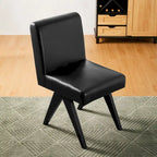 Sedie da pranzo imbottite in similpelle con gambe in legno a V