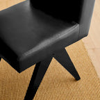 Sedie da pranzo imbottite in similpelle con gambe in legno a V